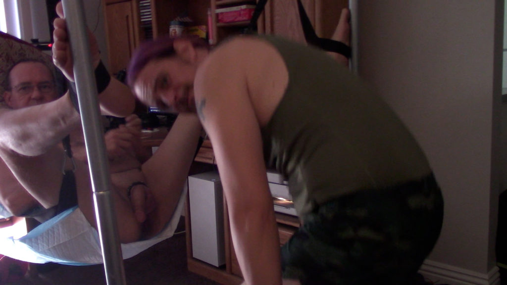 Jack Drago fist fucks DenvFist in his camouflage workout outfit.